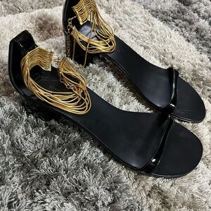 Giuseppe Zanotti Black and Gold Heels